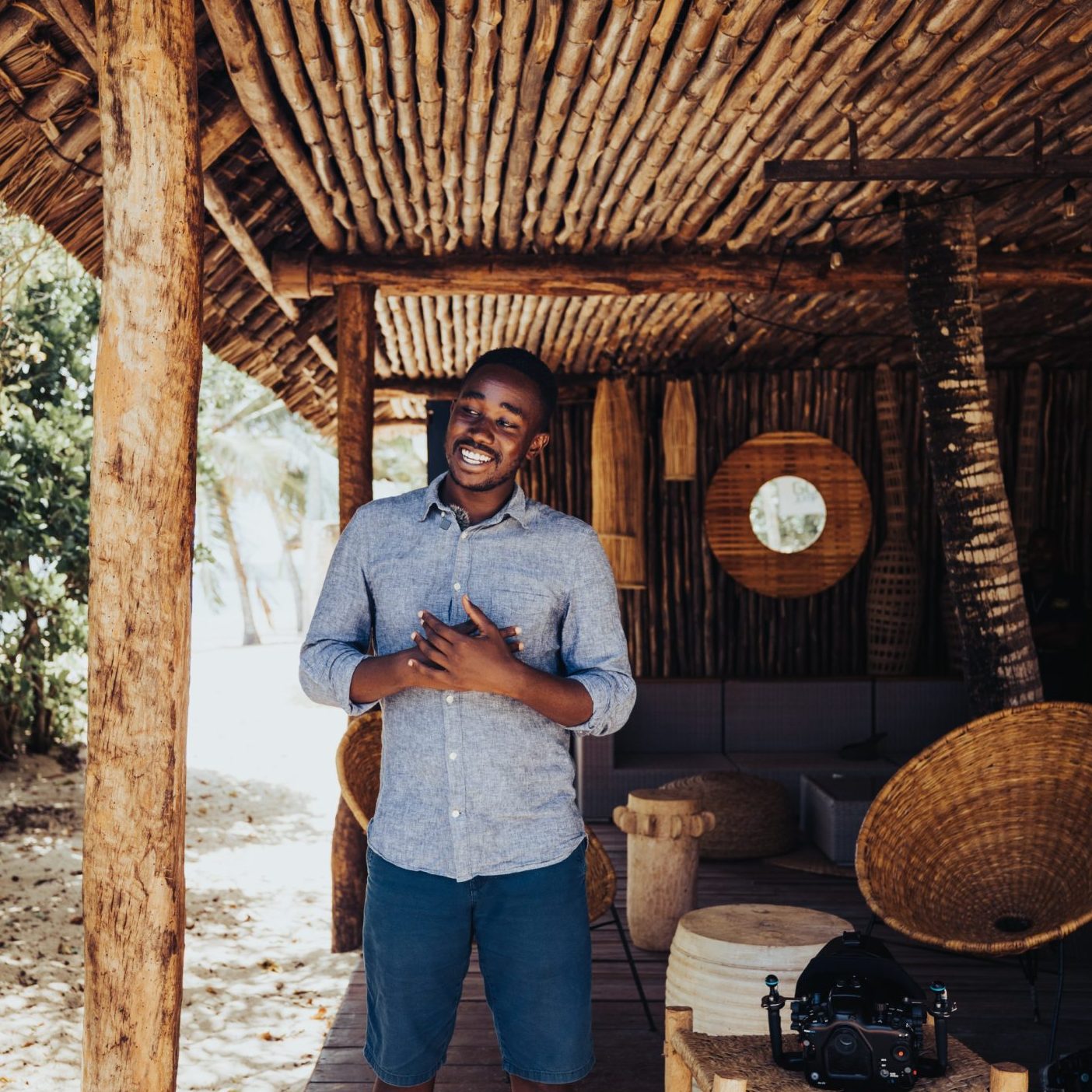 A man chilling in a wooden house