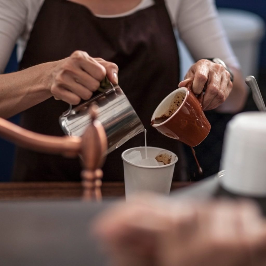 Barista preparing iced cofee